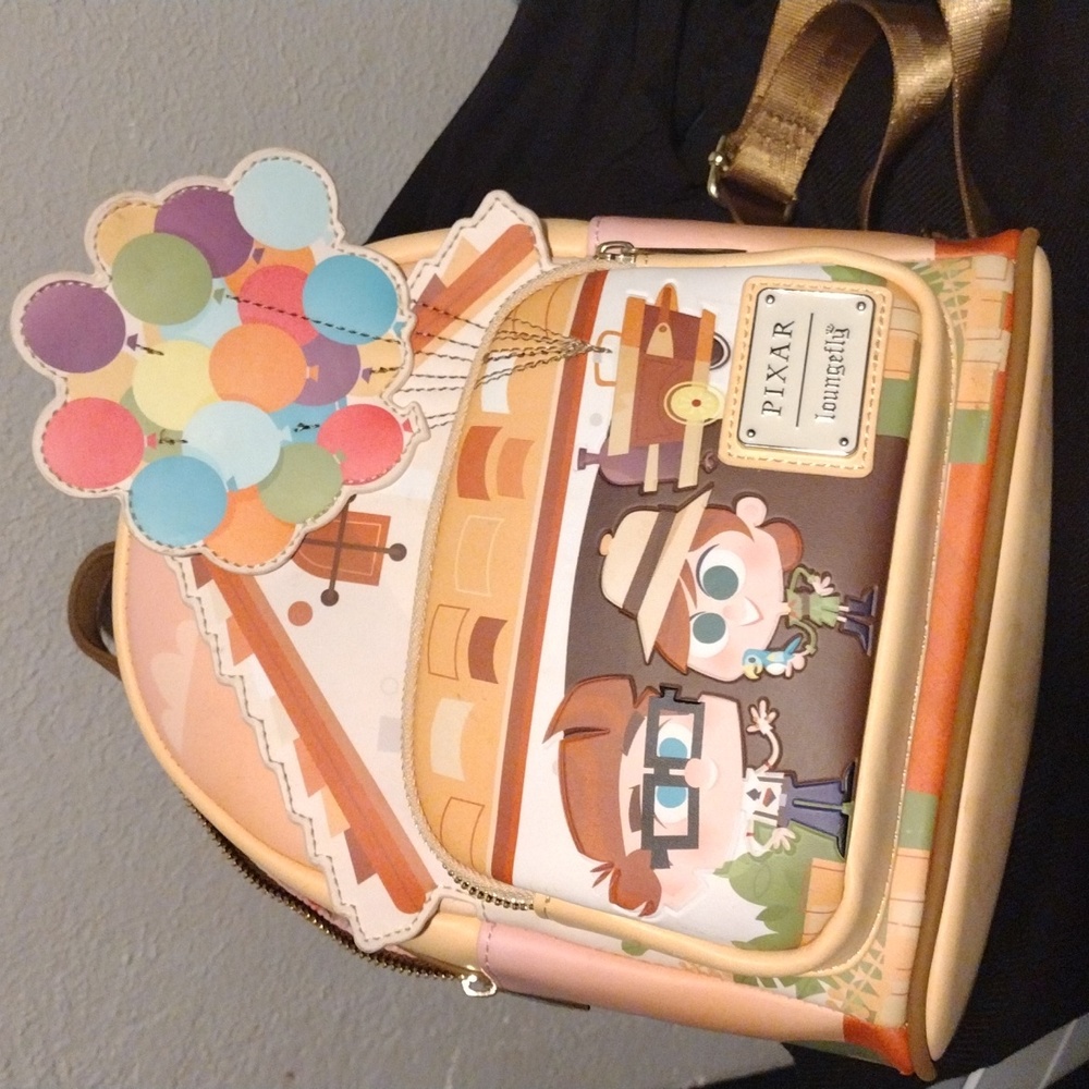 Lounge fly backpack. New clean perfect condition. Up movie theme.